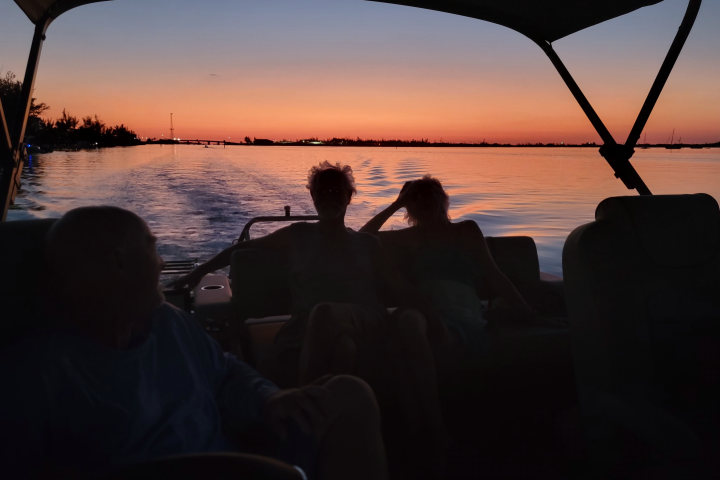 a sunset over a body of water